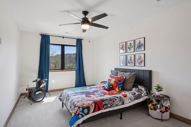 bedroom featuring carpet, baseboards, a ceiling fan, and visible vents