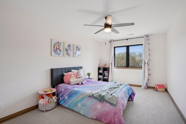bedroom featuring ceiling fan, carpet, baseboards, and visible vents