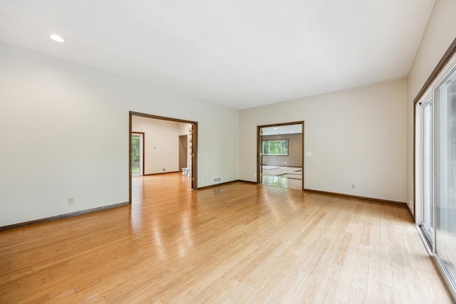 21 Red Fox Rd, North Oaks, MN 55127 - unfurnished room featuring light wood-type flooring and baseboards