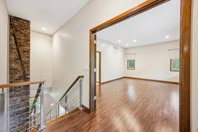 21 Red Fox Rd, North Oaks, MN 55127 - corridor with an upstairs landing, plenty of natural light, wood finished floors, baseboards, and recessed lighting