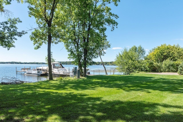 1510 Green Trees Rd, Orono, MN 55391 - view of yard featuring a dock and a water view