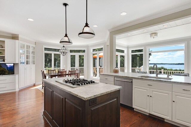 1510 Green Trees Rd, Orono, MN 55391 - kitchen featuring a sink, stainless steel dishwasher, white gas stovetop, ornamental molding, and plenty of natural light