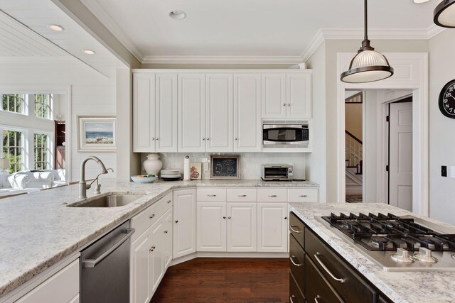 1510 Green Trees Rd, Orono, MN 55391 - kitchen with a sink, appliances with stainless steel finishes, ornamental molding, white cabinets, and dark wood-style floors