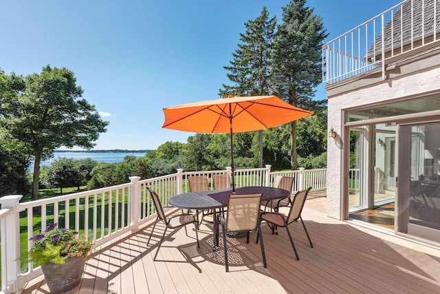 1510 Green Trees Rd, Orono, MN 55391 - wooden deck featuring outdoor dining space and a water view