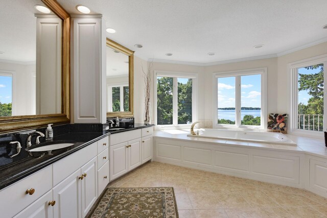1510 Green Trees Rd, Orono, MN 55391 - bathroom with plenty of natural light, ornamental molding, a garden tub, double vanity, and a water view