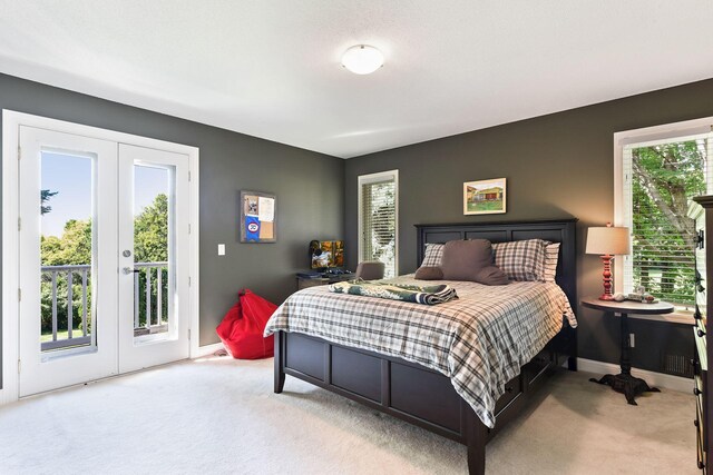 1510 Green Trees Rd, Orono, MN 55391 - bedroom featuring french doors, carpet flooring, access to exterior, and multiple windows