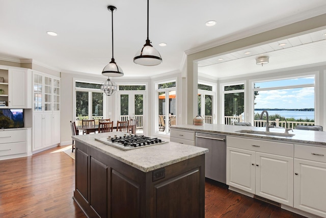 1510 Green Trees Rd, Orono, MN 55391 - kitchen with appliances with stainless steel finishes, a sink, crown molding, plenty of natural light, and white cabinets