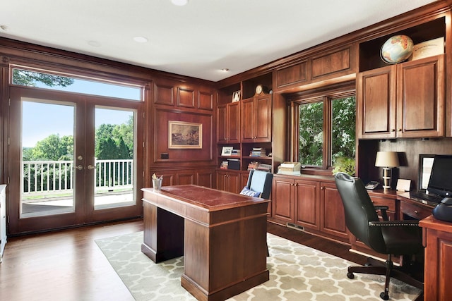 1510 Green Trees Rd, Orono, MN 55391 - office space featuring built in desk, french doors, and light wood-style floors