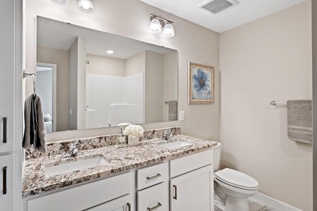 full bathroom featuring visible vents, a sink, walk in shower, and toilet