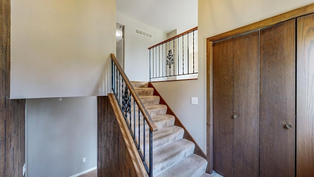 stairs featuring baseboards
