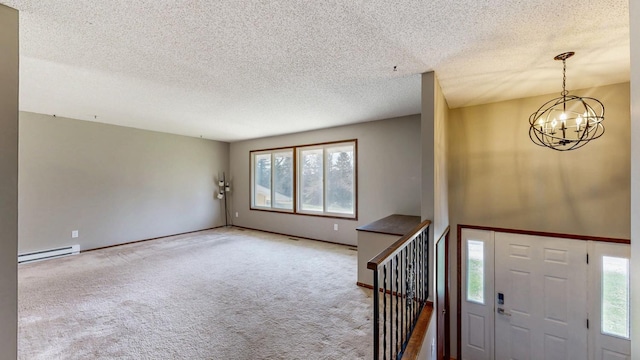 entryway featuring a baseboard radiator, a textured ceiling, a chandelier, carpet floors, and baseboards