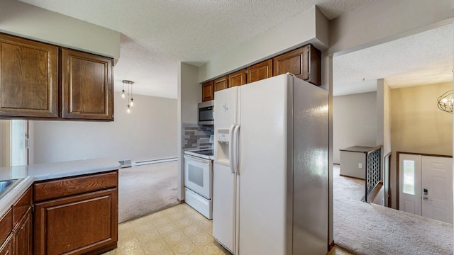 kitchen featuring white appliances, a textured ceiling, light colored carpet, light countertops, and tasteful backsplash