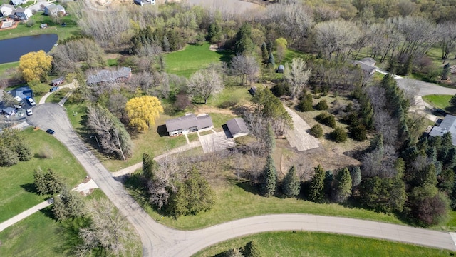 aerial view of property's location featuring a nearby body of water