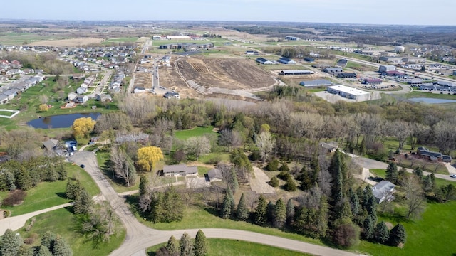 aerial view of property's location featuring a nearby body of water