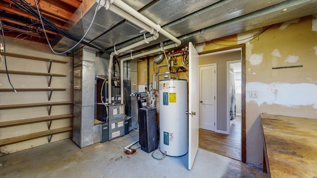 5904 Country View Ct NW, Rochester, MN 55901 - utility room with water heater and heating unit