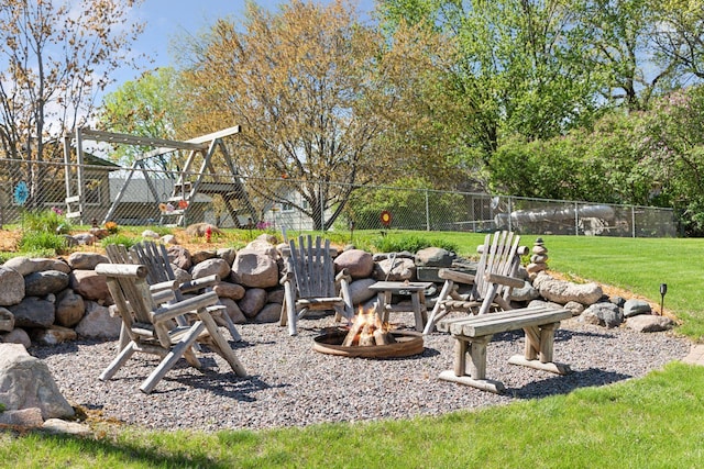 view of yard with an outdoor fire pit