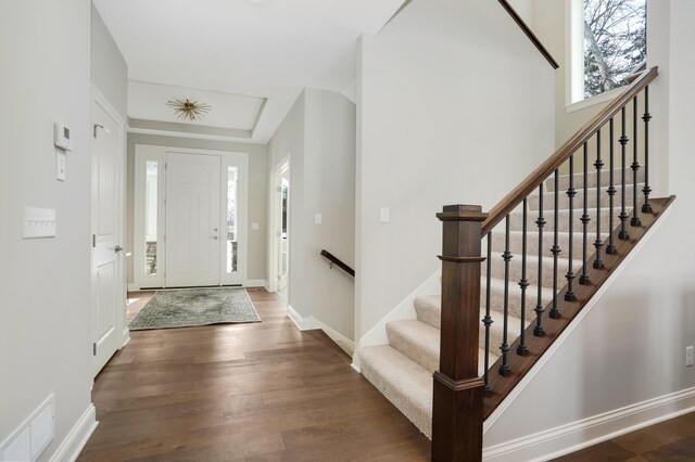 3338 Winfield Way SW, Prior Lake, MN 55372 - entrance foyer with baseboards, wood finished floors, and visible vents