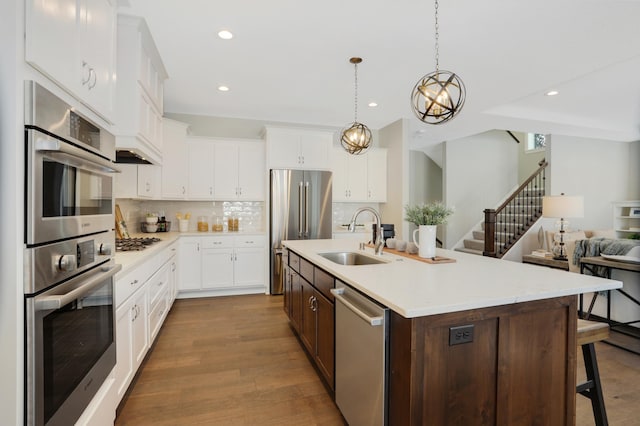 3338 Winfield Way SW, Prior Lake, MN 55372 - kitchen with recessed lighting, a sink, backsplash, and stainless steel appliances