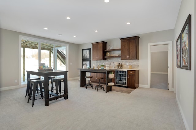 3338 Winfield Way SW, Prior Lake, MN 55372 - kitchen with beverage cooler, open shelves, light colored carpet, and recessed lighting