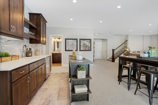 3338 Winfield Way SW, Prior Lake, MN 55372 - kitchen with recessed lighting, a sink, dishwasher, and dark brown cabinets