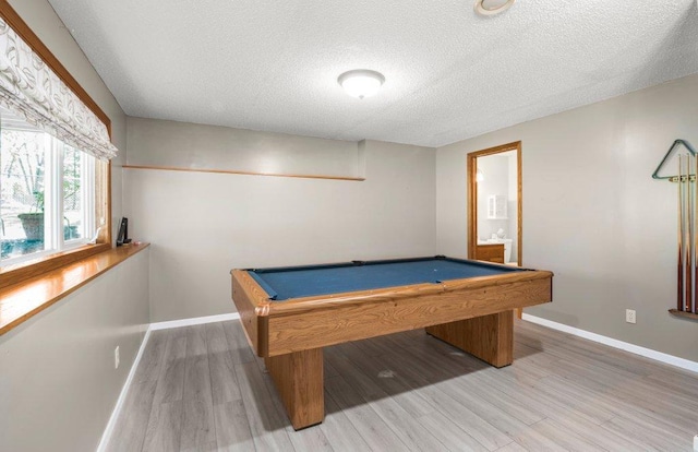 9967 Egret Blvd NW, Coon Rapids, MN 55433 - game room with a textured ceiling, baseboards, light wood-type flooring, and pool table