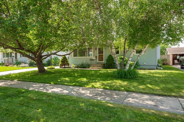 3618 1st St NW, Rochester, MN 55901 - obstructed view of property with a front yard