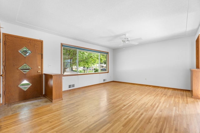 3618 1st St NW, Rochester, MN 55901 - empty room featuring light wood-type flooring and ceiling fan
