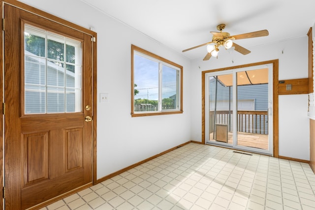 3618 1st St NW, Rochester, MN 55901 - foyer entrance with baseboards and a ceiling fan