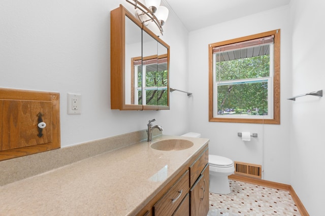 3618 1st St NW, Rochester, MN 55901 - bathroom with vanity and ornamental molding