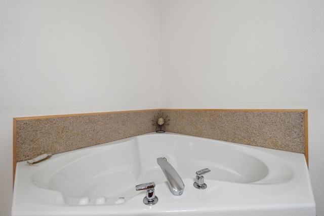 full bath with a bath