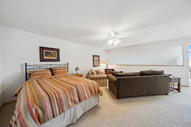 bedroom featuring light colored carpet and ceiling fan