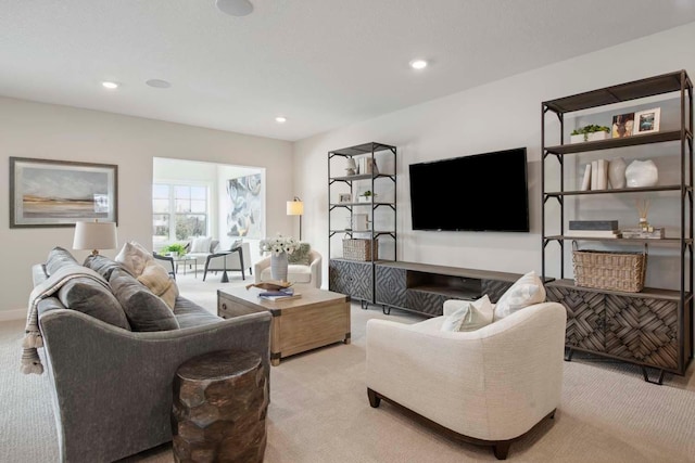 carpeted living room with recessed lighting