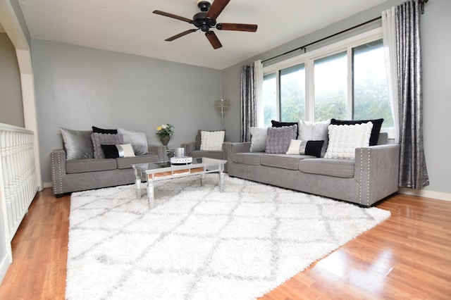 5634 142nd St W, Apple Valley, MN 55124 - living area with a ceiling fan, wood finished floors, and baseboards