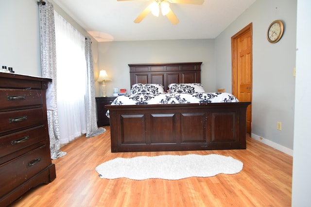 5634 142nd St W, Apple Valley, MN 55124 - bedroom featuring light wood-style flooring, baseboards, and a ceiling fan
