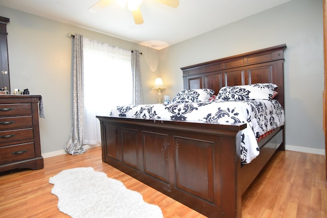5634 142nd St W, Apple Valley, MN 55124 - bedroom featuring light wood-type flooring, baseboards, and ceiling fan