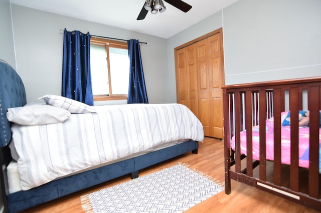 5634 142nd St W, Apple Valley, MN 55124 - bedroom featuring a closet, wood finished floors, and a ceiling fan