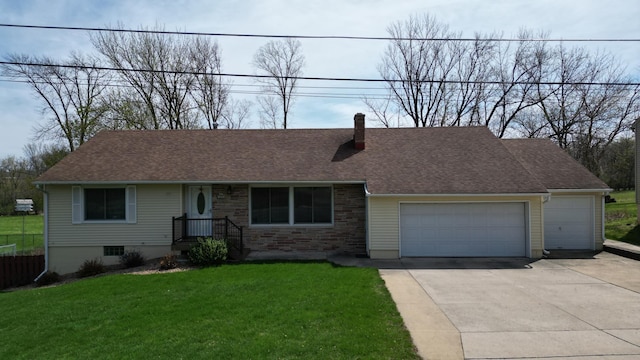 single story home with a chimney, a front lawn, concrete driveway, an attached garage, and a shingled roof