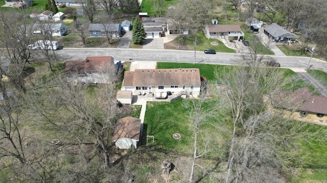 birds eye view of property with a residential view