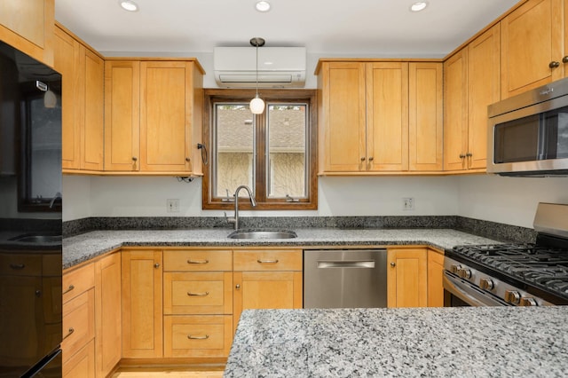 1287 Avon St N, Saint Paul, MN 55117 - kitchen with appliances with stainless steel finishes, a sink, a wall mounted AC, recessed lighting, and stone counters