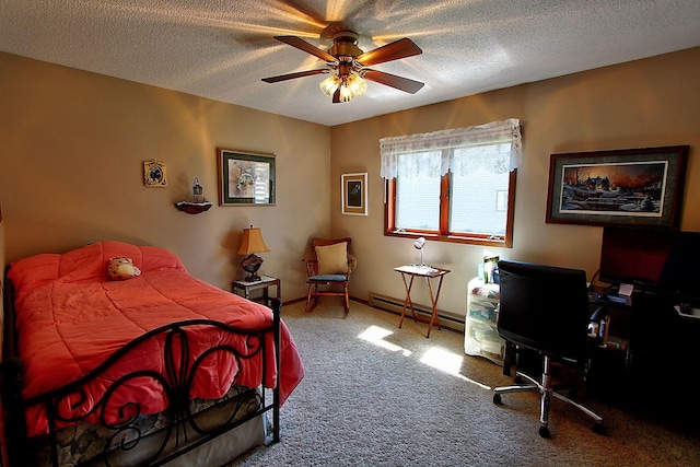 222 Sargent Dr Unit 102, Red Wing, MN 55066 - carpeted bedroom featuring a ceiling fan, a textured ceiling, baseboards, and a baseboard radiator