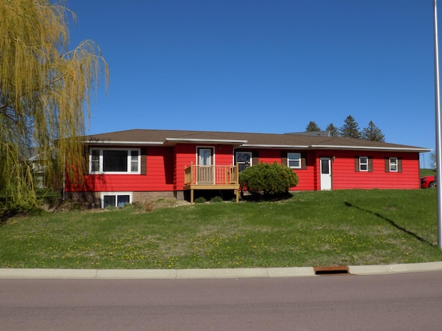 single story home with a front yard