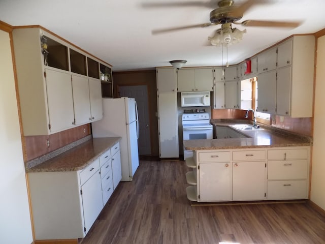 kitchen featuring a sink, open shelves, white appliances, and dark wood-style flooring
