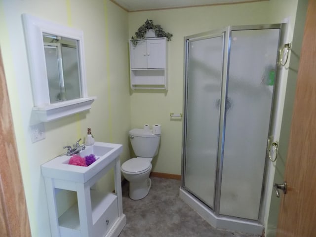 full bathroom with a stall shower and toilet
