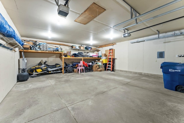 garage featuring a garage door opener and electric panel