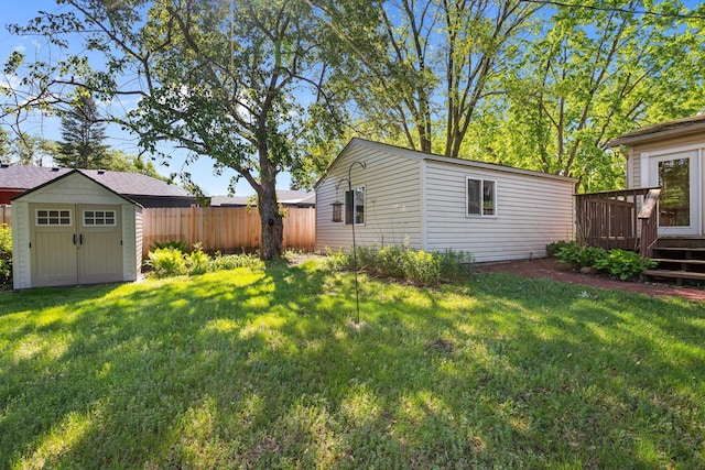 1791 Lois Dr, Shoreview, MN 55126 - view of yard with a deck