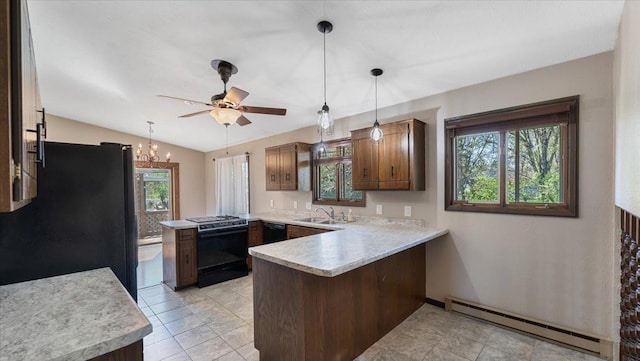 kitchen with black appliances, a baseboard heating unit, a peninsula, a sink, and light countertops