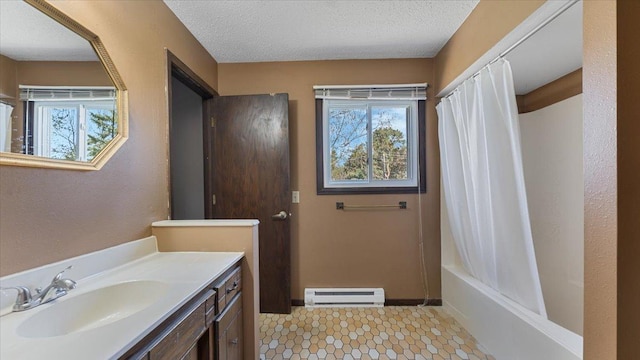 full bathroom with a baseboard radiator, vanity, baseboards, shower / tub combo with curtain, and a textured ceiling