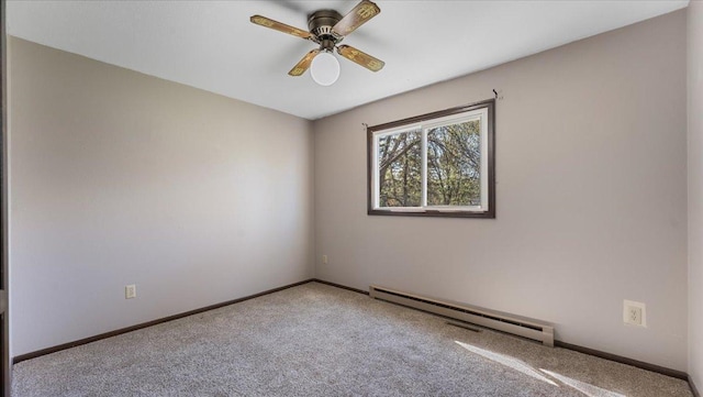 unfurnished room featuring baseboard heating, carpet floors, a ceiling fan, and baseboards