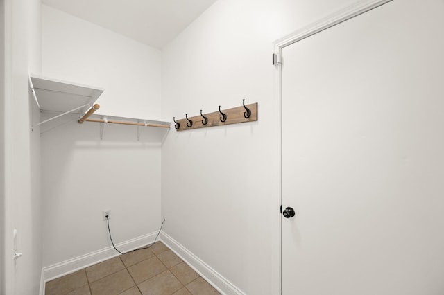 walk in closet featuring tile patterned floors
