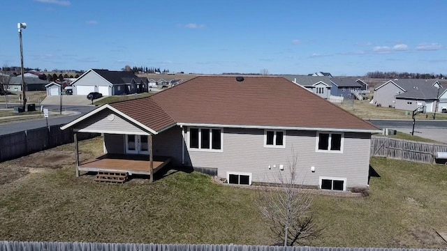 580 Canyon Ln NW, Eyota, MN 55934 - rear view of property with a residential view and a deck